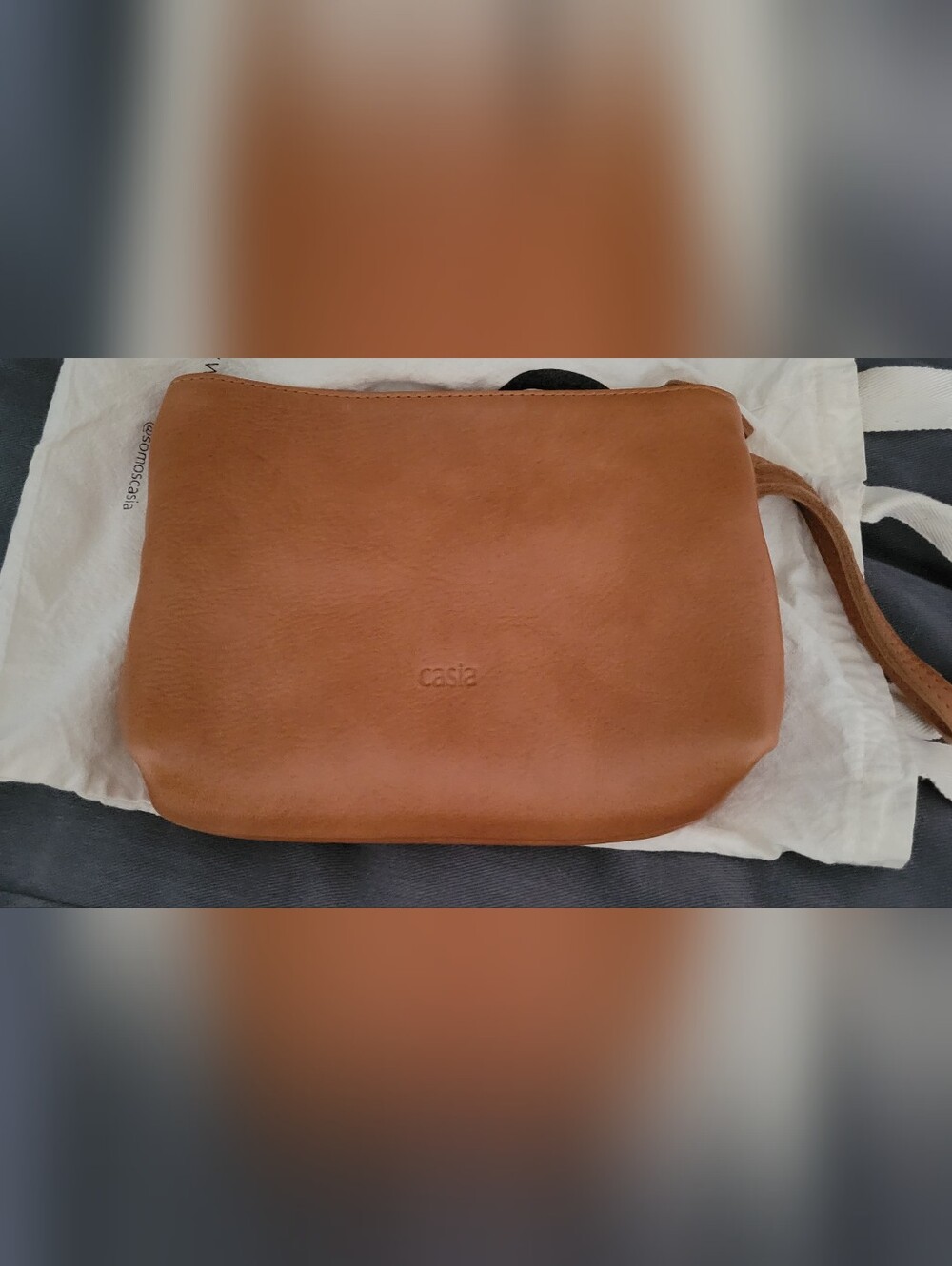 Casia Tan Leather Clutch Bag